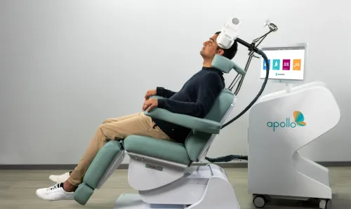 patient undergoes tms therapy with apollo tms system
